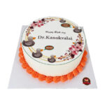 เค้กโฟโต้ทรงกลม บีบครีมสีส้มตกแต่ง