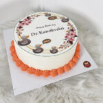 เค้กโฟโต้ทรงกลม บีบครีมสีส้มตกแต่ง - Image 2